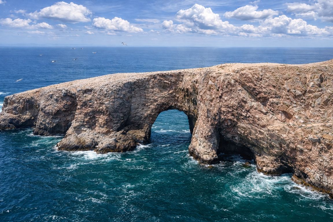Ballestas Islands coastal rock formations explored during Huacachina Tours guided tour