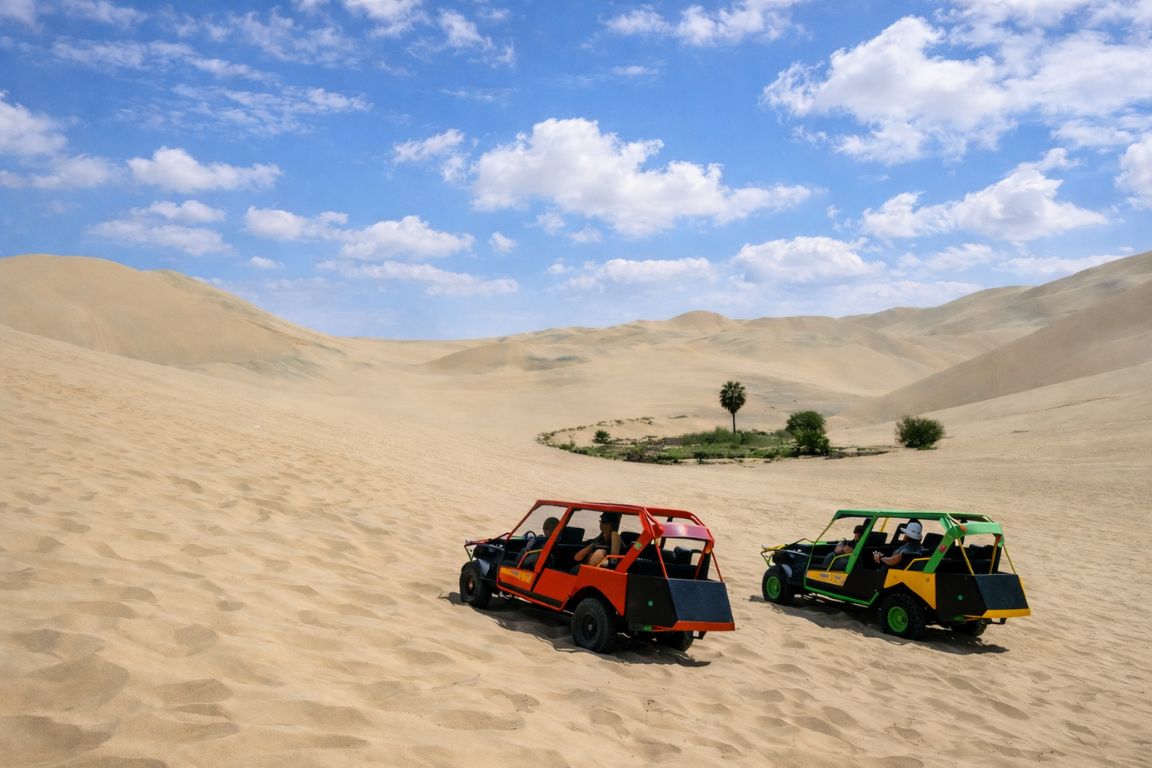 Dune buggy ride across Huacachina desert dunes during guided adventure with Huacachina Tours
